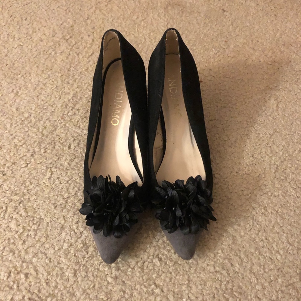 Black high heels with floral design
